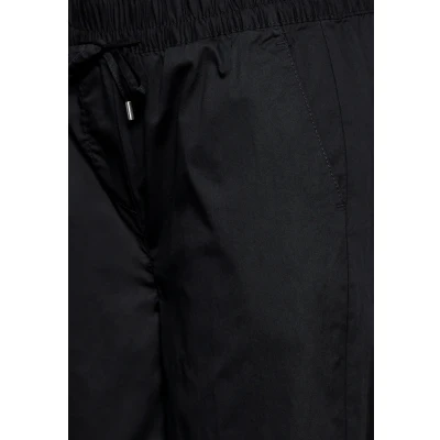 Bild av 7/8 byxor i lös passform, svart, XL x 26L