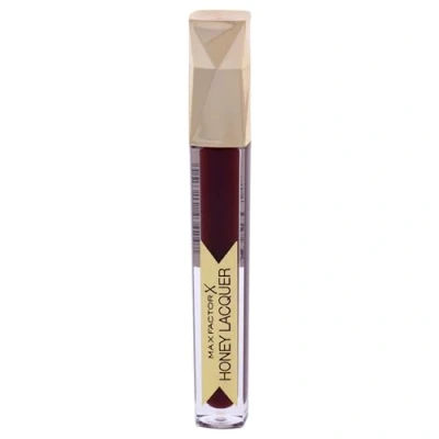 Bild av Max Factor Honey Lacquer Hyllor Bourgogne 40 Läppstiftsfärg, läppglans glans och läppbalsam fukt i ett Kraftig färg, smidig glänsande