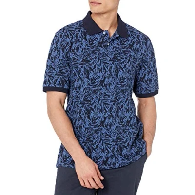 Bild av Amazon Essentials Men&#039;s Pikétröja i bomull med normal passform (finns Big &amp; Tall), Indigoblå Palmbladstryck, M