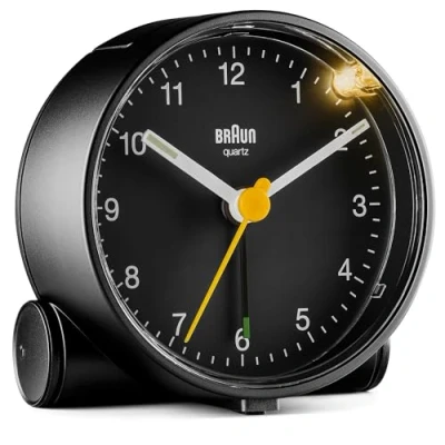 Bild av Braun Classic Analogue Alarm Clock with Snooze and Light, Quiet Quartz Movement, Crescendo Beep in Black, model BC01B.
