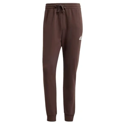 Bild av adidas För Män Essentials Fleece Regular Tapered Pants, Shadow Brown F23, XXS