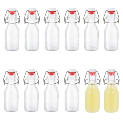 Bild av Zanfqvo glasflaskor 100 ml med strykförslutning, 12 stycken små flaskor för fyllning, strykflaska olja, vinäger, juice och limonad
