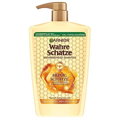 Bild av Garnier True Treasures Reparerande schampo honung skatter; XXL Format 1L, stärker och ger näring åt skadat sprött hår, 1000 ml