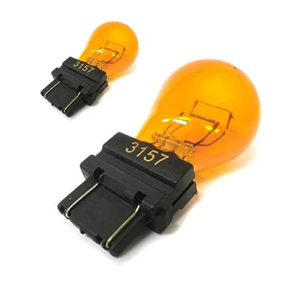 Bild av 2 stycken 12V billampor, halvljus, helljus, dimljus etc. (3157 Amber T25 PY27/7W 27/7W W2.5x16q)