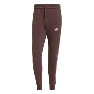 Bild av adidas För Män Essentials Fleece 3 Stripes Tapered Cuff Pants, preloved crimson, L Short