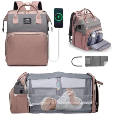 Bild av YUDOXN Blöjryggsäckar för bebisar, bärbar spjälsäng spädbarn och barn, hopfällbar, multifunktionell spjälsängsryggsäck organisatör med skötbord, Rosa
