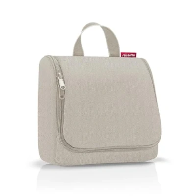 Bild av reisenthel toiletbag praktisk necessär med krokar, vattenavvisande material, fiskben sand, Unica, Sporter