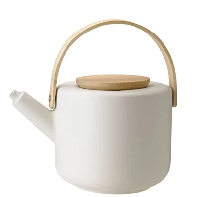 Bild av Stelton Tekanna Theo rustik stengodskanna, bambulock och handtag modern skandinavisk design, gjutjärnsfinish snyggt tetillbehör 22 x 16 cm, 1,25 liter, sandfärger