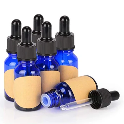 Bild av stonylab Glas Droppflaska 6 Pack, Tom Glasflaska med Konglasdroppare, Inre Propp och Etikett för Eteriska Oljor, Aromaterapidofter (15 ml, Blå)