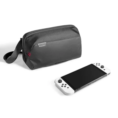 Bild av tomtoc Bärväska, axelväska för Nintendo Switch/Switch OLED modell, allsidigt skydd, liten Sling Bag med 20 spelkassetter, passar Switch Pro Controller, laddare