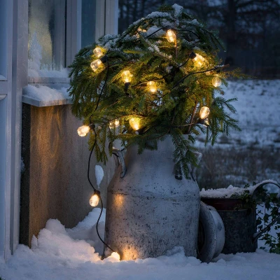 Bild av Konstsmide Christmas Ljusslinga för ölträdgård 20 droppar klar bärnsten