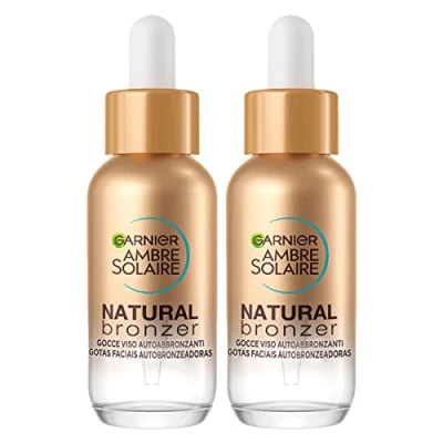 Bild av Garnier Ambre Solaire Natural Bronzer Självsolande ansiktsdroppar med aktivt solbränna från vegetabiliskt ursprung vegansk formel doftfri hyaluronsyra och kokosnötsvatten 2 flaskor på 30 ml