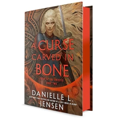 Bild av A Curse Carved in Bone: Book Two of the Saga Unfated: 2