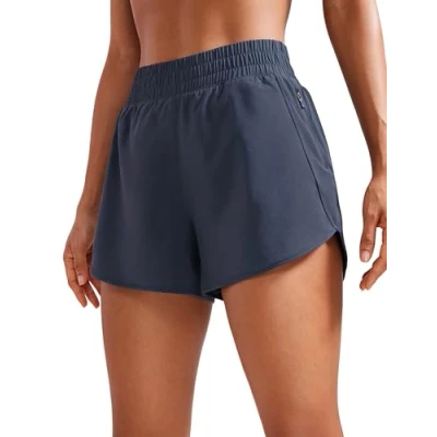 Bild av CRZ YOGA löparshorts för dam med hög midja 3 tums meshfoder som torkar snabbt träningsbyxor gym blixtlåsficka Marin XS