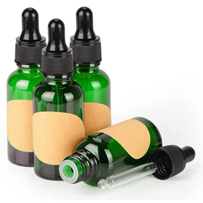 Bild av stonylab Glas Droppflaska 4 Pack, Tom Glasflaska med Konglasdroppare, Inre Propp och Etikett för Eteriska Oljor, Aromaterapidofter (30 ml, Grönt)