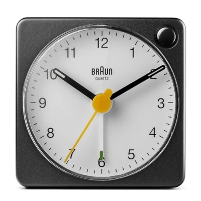 Bild av Braun Classic travel Analogue Alarm Clock with Snooze and Light, Compact Size, Quiet Quartz Movement, Crescendo Beep in Black White, model BC02XBW.