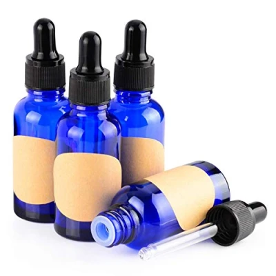 Bild av stonylab Glas Droppflaska 4 Pack, Tom Glasflaska med Konglasdroppare, Inre Propp och Etikett för Eteriska Oljor, Aromaterapidofter (30 ml, Blå)