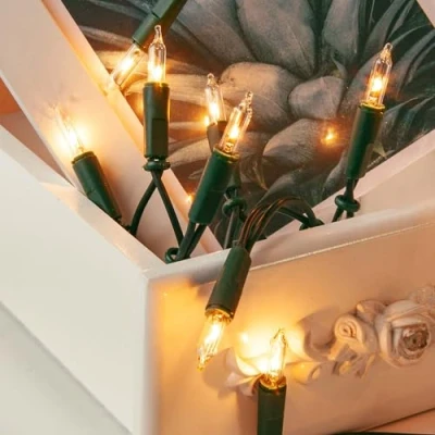 Bild av Hellum Julgran inomhus ljusslinga med 10 varmvita lampor. juldekoration modern grön kabel kontakt 1,35 m. Dekoration vardagsrum, julgransbelysning, 831115