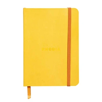 Bild av RHODIA 117316C Jonquille Soft Notebook A6 fodrad 144 sidor Clairefontaine elfenbensfärgat papper 90 g/m bokmärke, elastisk stängning fodral i konstläder Rhodiarama Collection