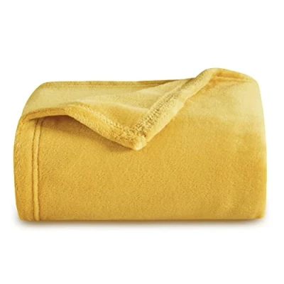 Bild av Bedsure Flanell sofffilt 130x150cm Extra mjuk 100% mikrofiber Vändbar 90 sängfilt Senapsgult andningsfilt