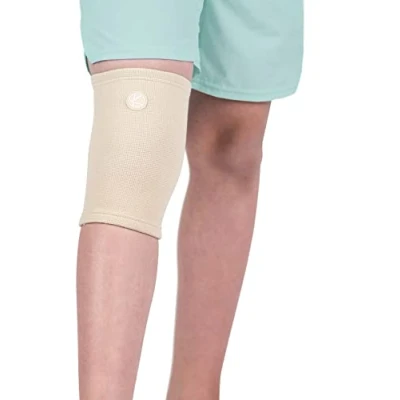 Bild av KARM Knäbandage barn för flickor och pojkar knä kompression bandage sport fotboll gymnastik knäproblem barnkompression knäärm (1 st, beige)