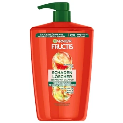 Bild av Garnier Fructis skadesläckare reparerande schampo för skadat hår XXL, med amlaolja och vegetabiliska keraproteiner mindre kluvna toppar, maxi format, 1000 ml