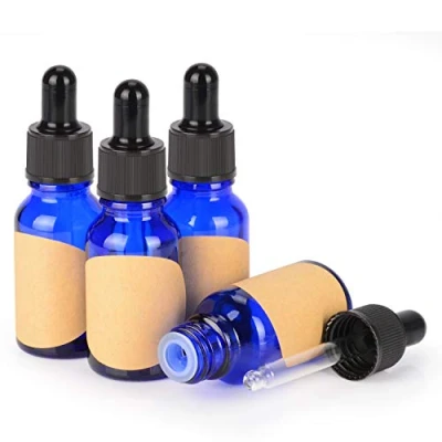 Bild av stonylab Glas Droppflaska 4 Pack, Tom Glasflaska med Konglasdroppare, Inre Propp och Etikett för Eteriska Oljor, Aromaterapidofter (15 ml, Blå)