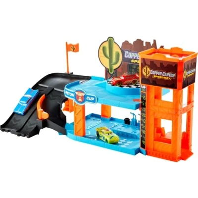 Bild av Mattel Disney och Pixar Bilar Glow Racers lekset tre leksaksbilar, kopparkanjon med lysande garage, självlysande delar fordon i skala 1:55, HPX75