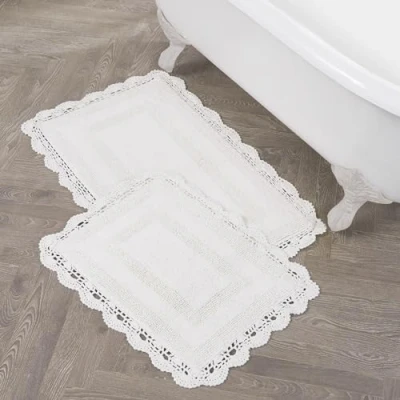 Bild av Laura Ashley virkad bomull 17 x 24/21 34 tum. 2 delad badmatta set, krämvit