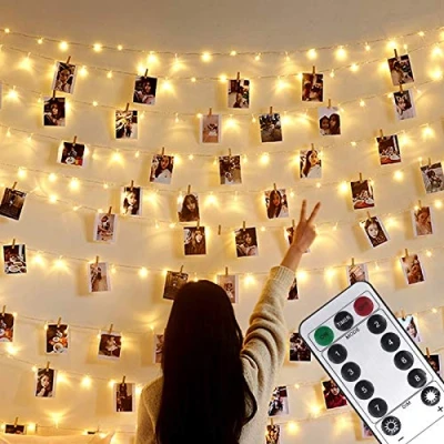 Bild av Mikrowear fotoklämma ljusslingor, USB eller batteridriven, 100 LED 10 m koppartråd hängande ljusslinga med fjärrkontroll, dekoration för inomhus sovrum bröllopsfest (50 klämmor och 25 naglar, 8 lägen)