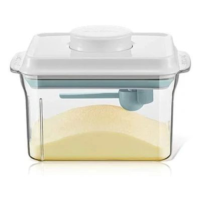Bild av Dispenser för MjöLkpulver.1L Transparent Den lufttäta lådan med mjölkpulver sked gjord av livsmedelsmaterial är hygienisk och praktisk. används att lagra mjölkpulver, frukt mat barn.